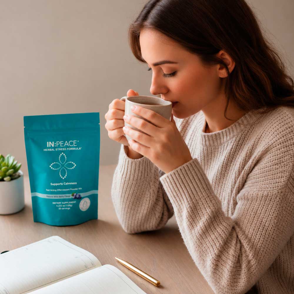 Woman sipping  IN PEACE stress support formula