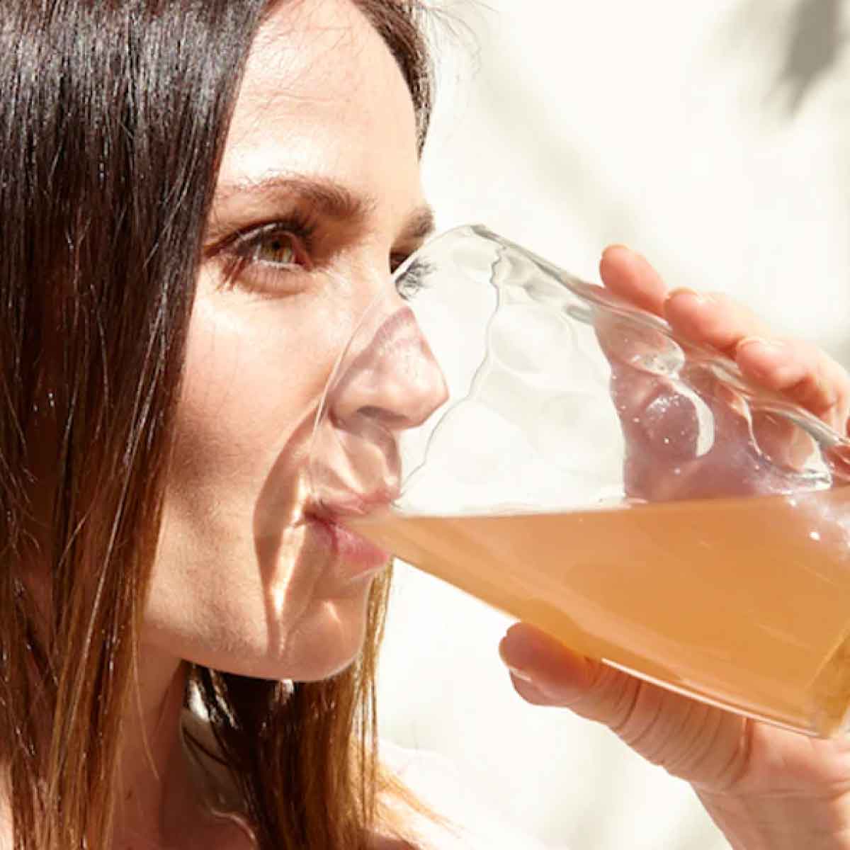 woman drinking formula